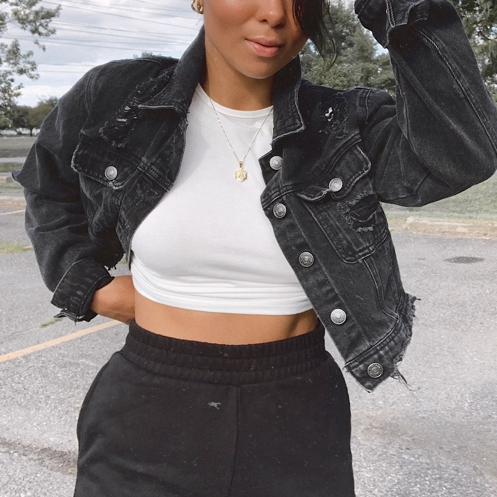 Distressed black denim jacket